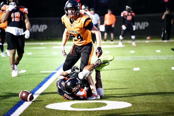 How are UK car manufacturers innovating to reduce emissions?